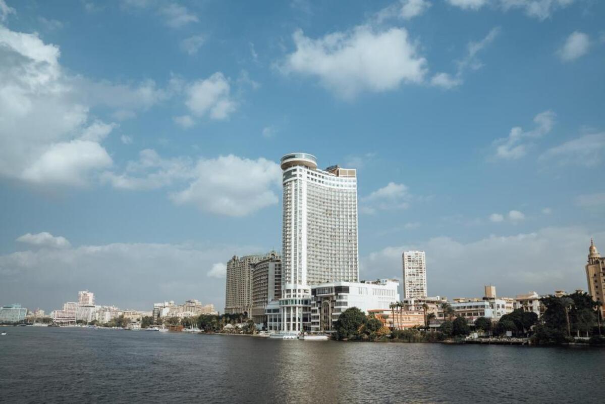 Grand Nile Tower Hotel in Cairo with a view of the Nile River and luxurious amenities