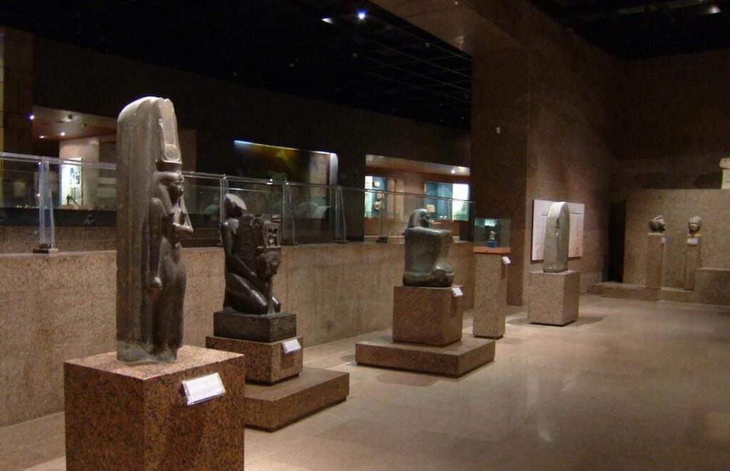 Ancient statues and artifacts on display inside the Nubian Museum.