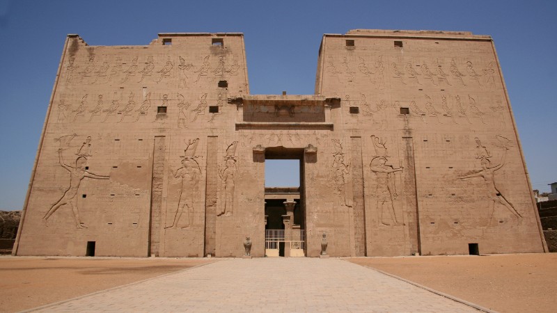 "Front view of the towering Edfu Temple entrance."