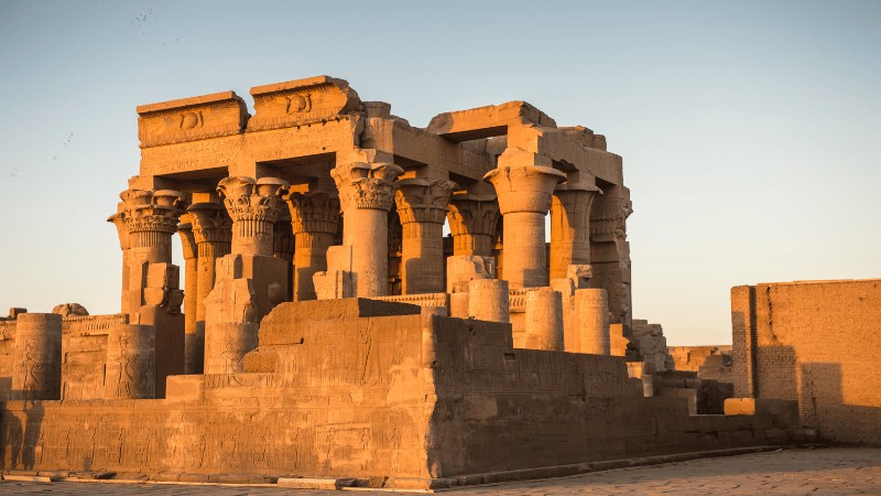 "Ancient Kom Ombo Temple in Egypt, illuminated by the warm glow of sunset."