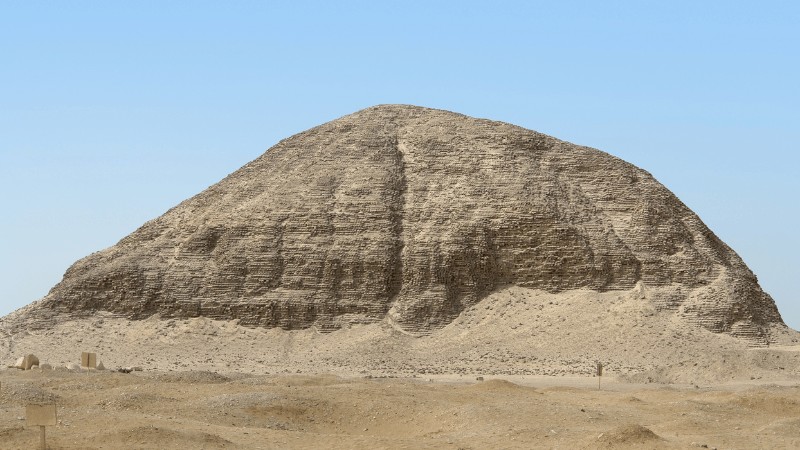 "Image of the Meydum Pyramid in Egypt under a clear blue sky."