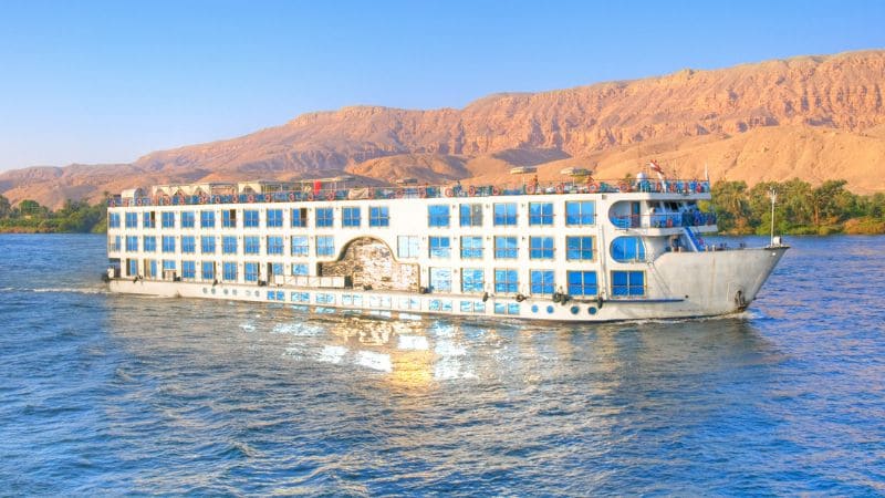 A cruise ship sails on the Nile River in Egypt.