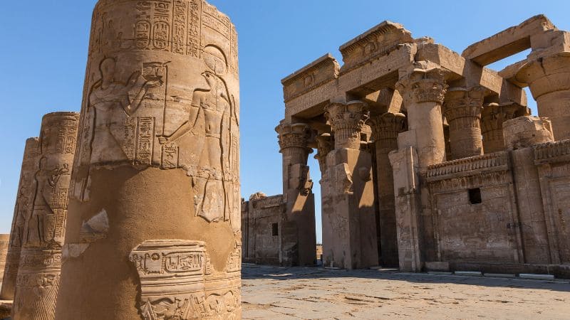 Carved pillars and hieroglyphs in the ancient Kom Ombo Temple in Egypt.