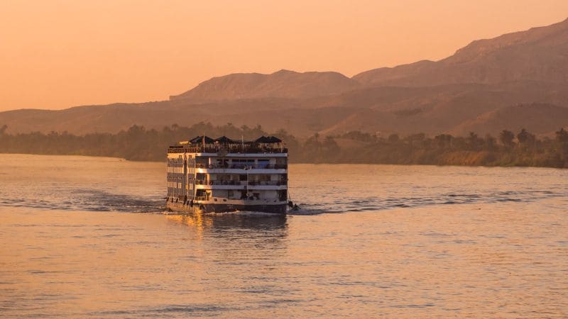 River cruise ship on the Nile at sunset.