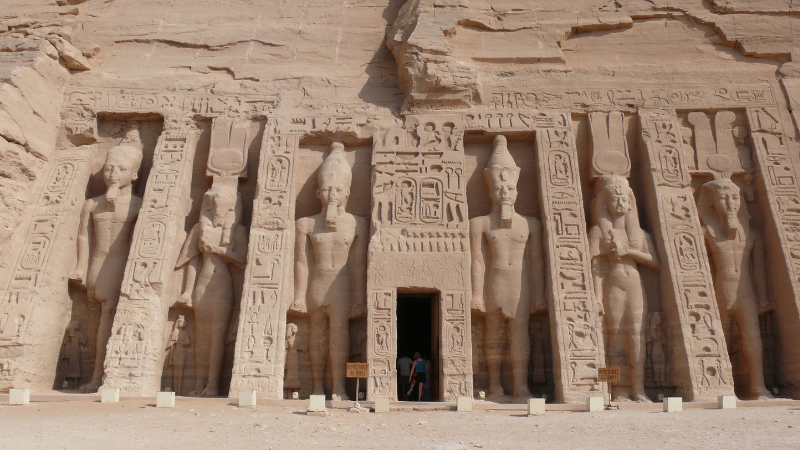 The entrance to the Small Temple at Abu Simbel, lined with statues of Pharaoh Ramses II and Queen Nefertari.