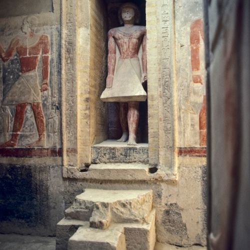 Statue in niche of an Egyptian tomb