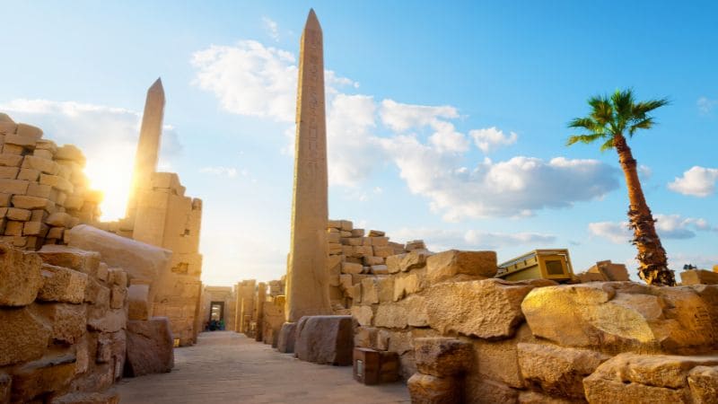 Ancient obelisks and ruins at Karnak Temple in Luxor, Egypt.