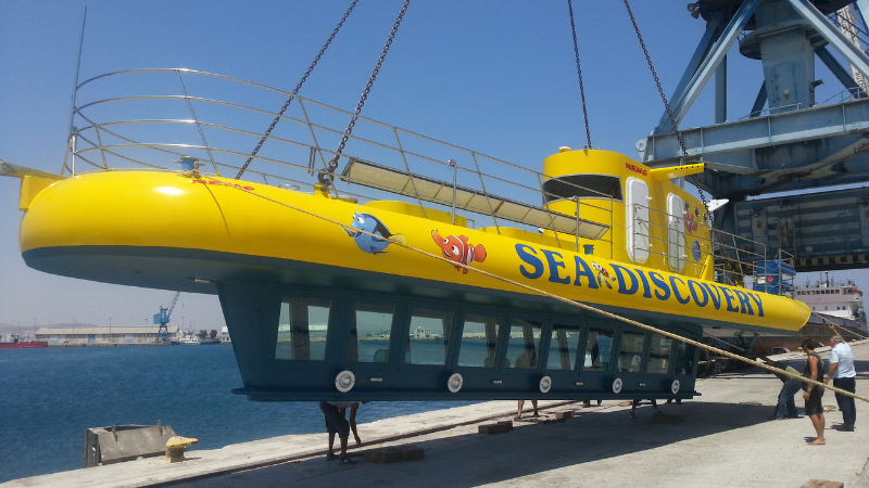 A bright yellow seascope submarine designed for tourist underwater exploration