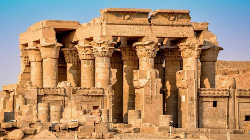 Daytime view of the ruins of Kom Ombo temple with clear skies