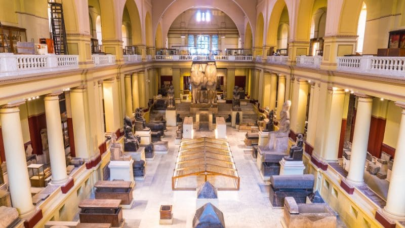 Interior of the Egyptian Museum in Cairo, showcasing ancient artifacts.