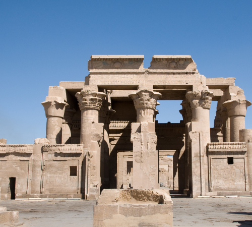 Ruins of the double temple of Kom Ombo under a clear blue sky in Egypt