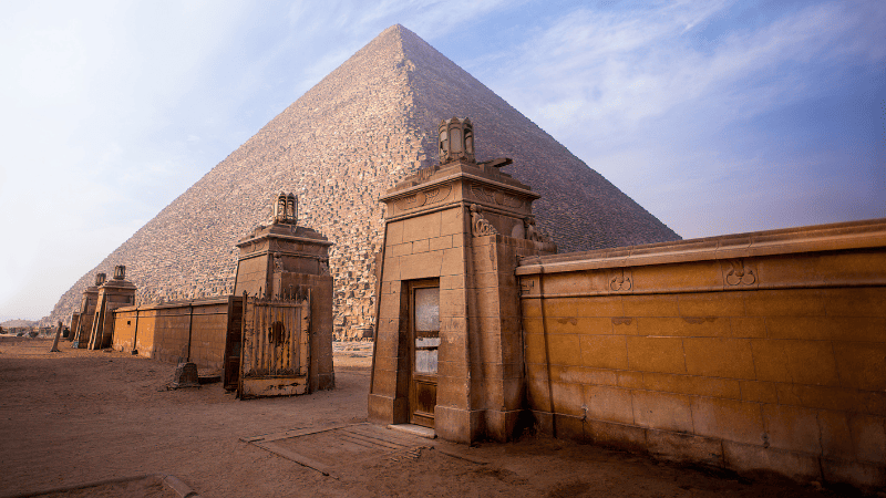 The Great Pyramid of Giza with an ancient temple in the foreground