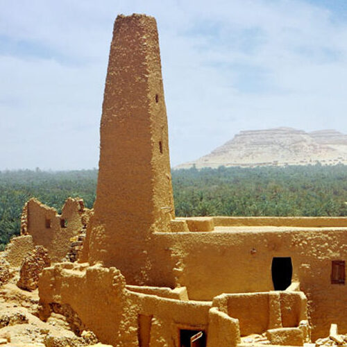 Ancient mud-brick minaret towering over the Siwa Oasis