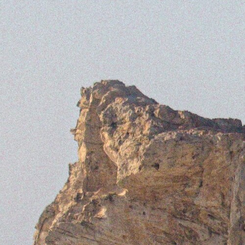 Close-up of a rock formation resembling a profile of a face