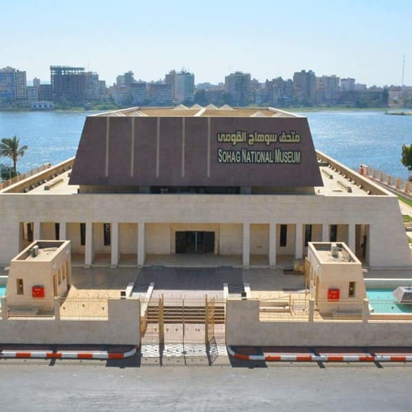 front view of the Sohag National Museum in Egypt with the Nile River in the background
