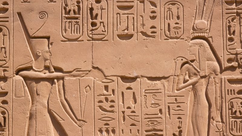 Close-up of the detailed wall carvings at the Temple of Philae in Egypt.