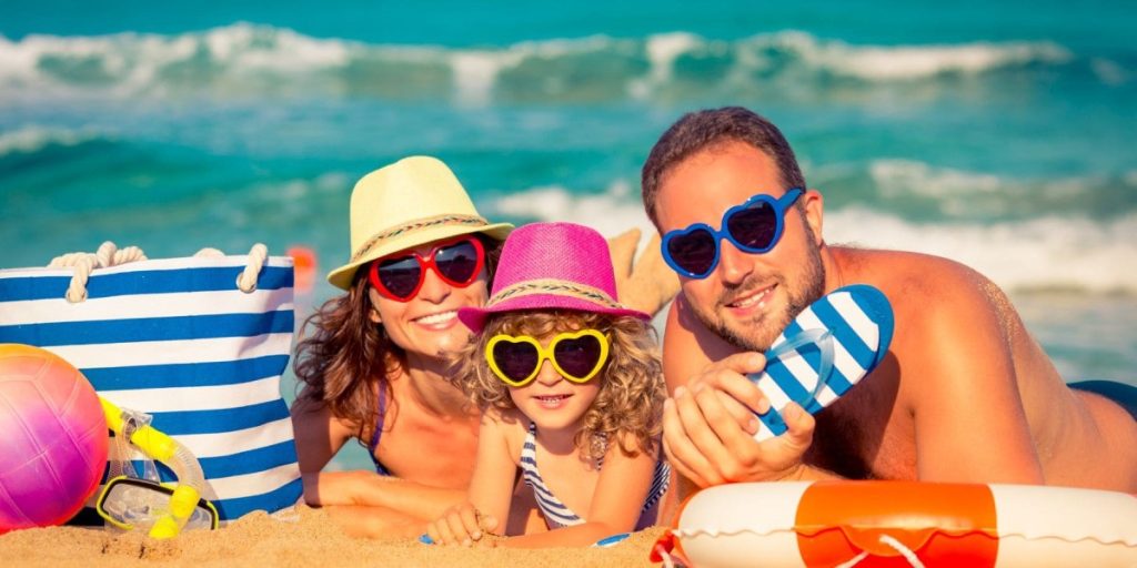 Family enjoying a sunny day at the beach