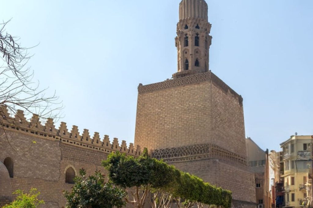 Historic minaret in Cairo with intricate architectural details