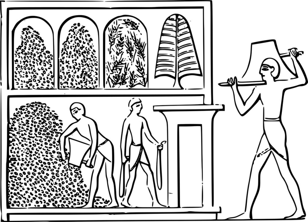 Ancient Egyptian figures depicted in the process of wine making, with grape harvesting and pressing shown in a stylized, hieroglyphic art form