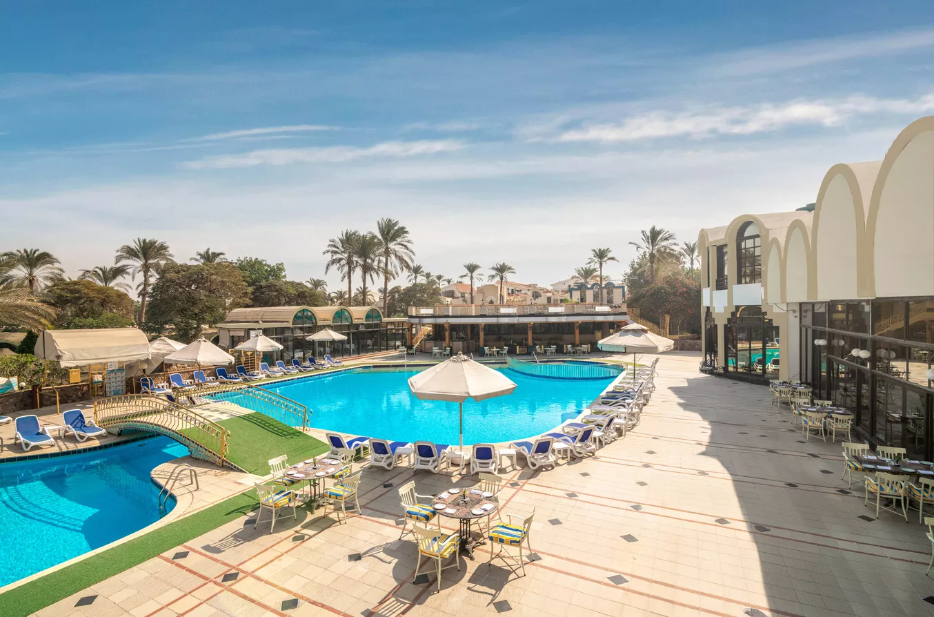 Elegant Cairo Pyramids Hotel with a view of the pyramids and lush gardens