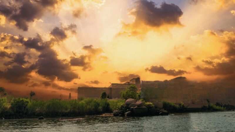 dramatic sunset over nile temple