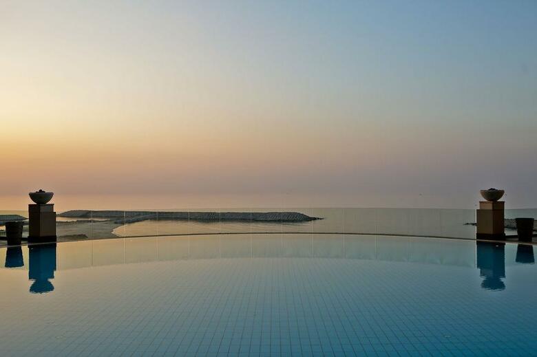 Four Seasons Hotel Alexandria with a luxurious pool area and Mediterranean Sea views