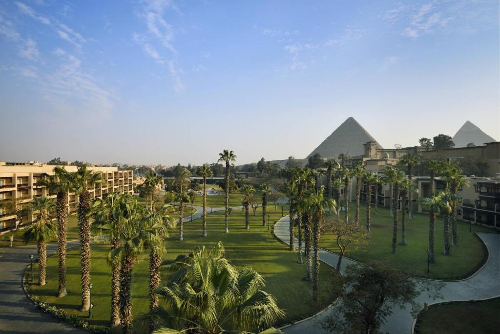 Marriott Mena House Hotel in Cairo with a view of the pyramids and luxurious garden surroundings