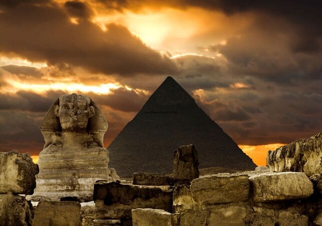 The Pyramids of Giza standing tall under a clear blue sky in Egypt