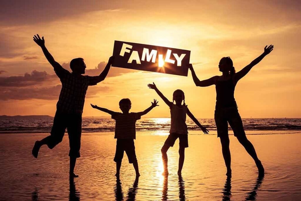 Happy family enjoying a fun day at a beautiful beach in Egypt, with golden sand, clear blue water, and a sunny sky
