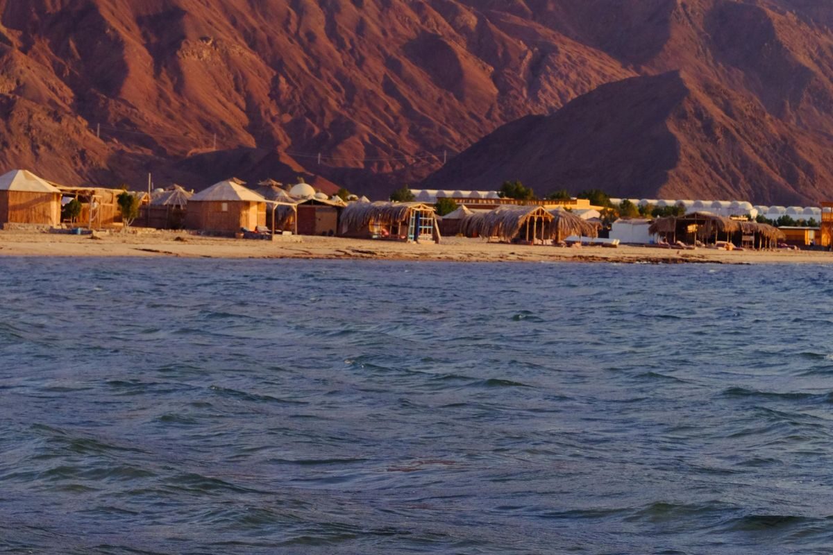 Scenic view of Nuweiba with clear blue waters and mountainous backdrop