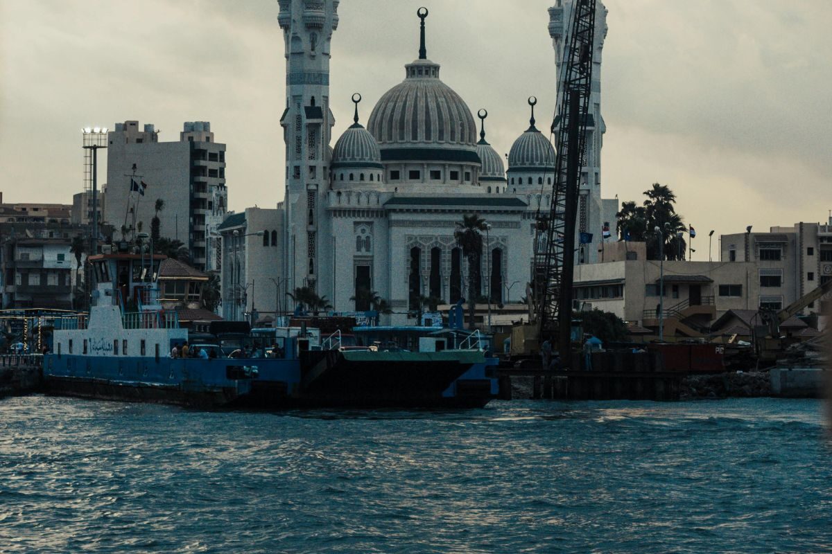 Port Said waterfront with historic buildings and a view of the Suez Canal