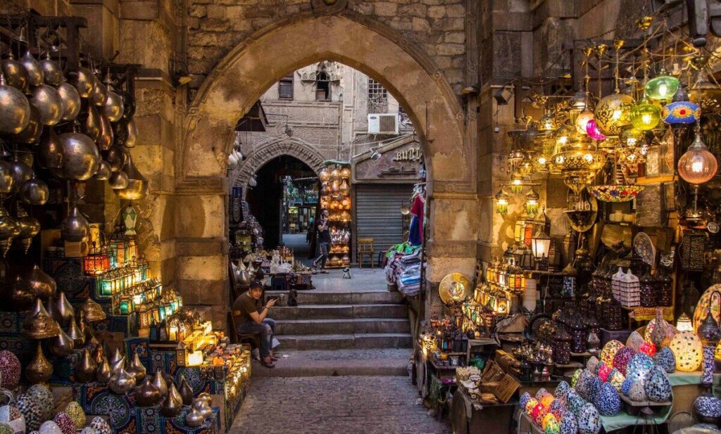 Khan El Khalili bazaar alley with traditional lanterns and antique shops