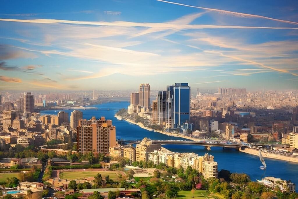 Aerial view of Cairo skyline and the Nile River with bridges and city lights