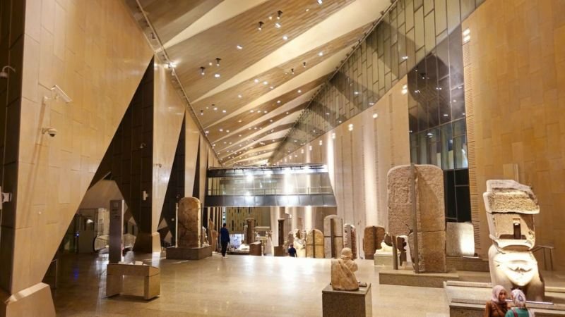 Interior hall of the Grand Egyptian Museum with artifacts