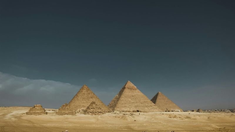 Pyramids of Giza rising above the desert