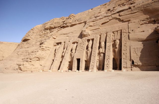 The facade of Queen Nefertari's Temple at Abu Simbel with six standing statues.